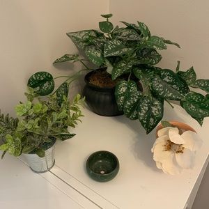 Assorted fake plants and planters